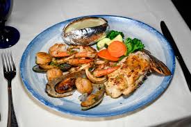 Driftwoods Seafood & Steak Restaurant signature dishes Chicken & Shrimp Cajun Alfredo
Carolina Fantail Shrimp
Flounder Dinner